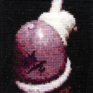 Hung — original 4×4 inch hand-stitched cross-stitch of a bunch of grapes in deep plum, dusty mauve, coral pink, and cream stitched on black Aida cloth