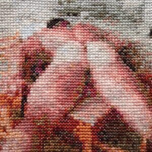 Lunch — original 4×4 inch hand-stitched erotic cross-stitch in warm blush pink, terracotta, burnt orange, and cream tones on Aida cloth, an intimate close-up composition